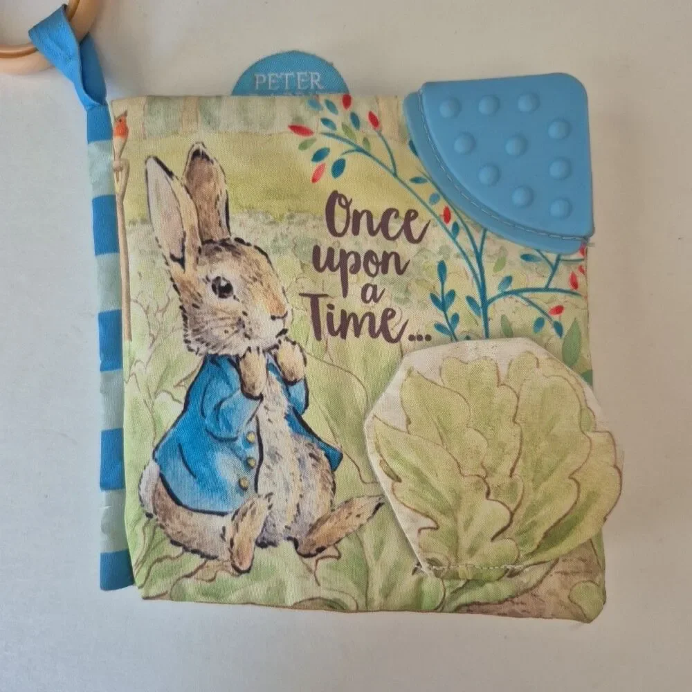 Peter Rabbit Soft Squeaky Baby Book with Silicone Teether & On the Go Clip
